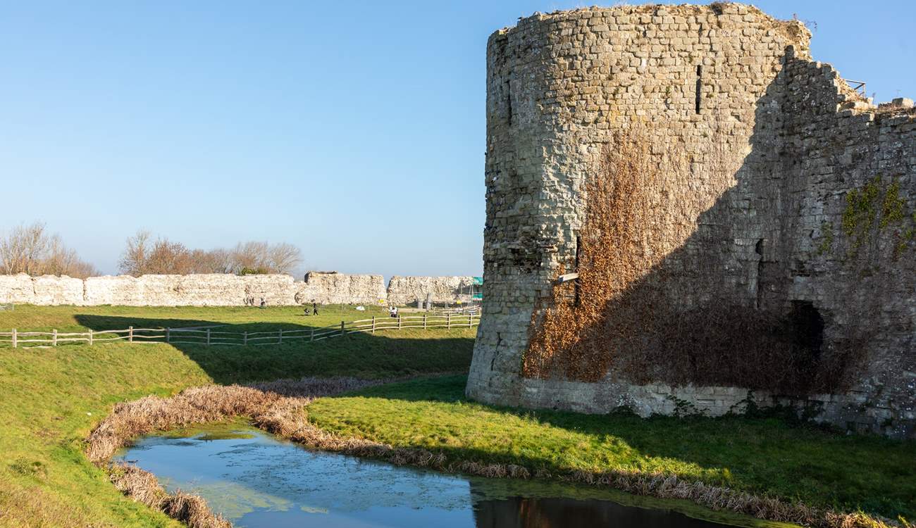 Visit the ruins of Pevensey Castle.