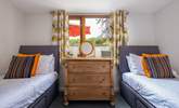 There is a delightful twin bedroom. - Thumbnail Image