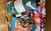 Get a Dogtastic Welcome fold up bag to take home when you book between 01/05/2025 and 01/09/2025.  In the bag is a blanket, chews, poo bags and Dogs Welcome Pubs list. - Thumbnail Image