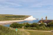 Explore the coastal path and take in the views along the coastguard cottages at Cuckmere Haven and the iconic Seven Sisters chalk cliffs.