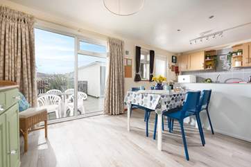 The door from the sociable kitchen/diner leads to the outside patio giving you the choice of where to dine depending on the weather.