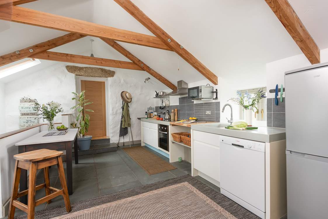 The kitchen is very well-equipped. Just leading off from the kitchen you will find stairs which take you down to bedroom three and the second family bathroom. 
