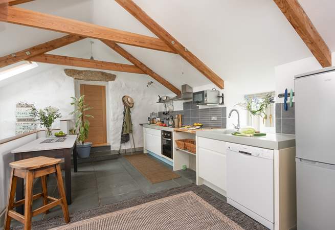 The kitchen is very well-equipped. Just leading off from the kitchen you will find stairs which take you down to bedroom three and the second family bathroom. 