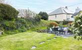 The large south-facing back garden is perfect for al fresco dining.  - Thumbnail Image