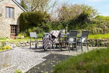 The pretty garden is perfect for al fresco dining.