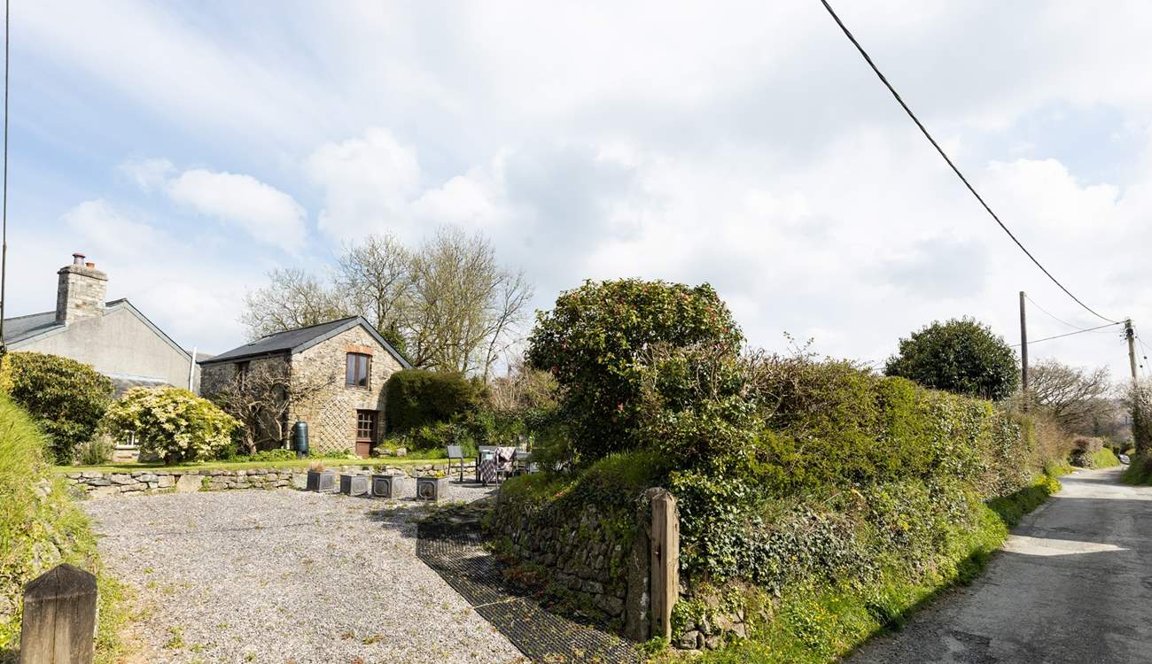 The large parking area provides ample parking for 2 cars and is accessed via the back lane.