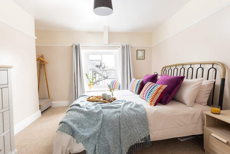 Bedroom four has lovely furnishings and bed linens; this is a room you can retreat to!