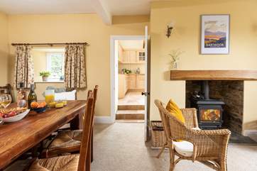 The dining-room has a warming wood-burner.
Please note the steps up to the kitchen