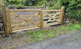 The back garden is enclosed by a handy gate. - Thumbnail Image