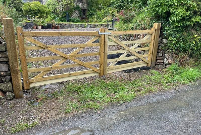 The garden is enclosed by a handy gate.