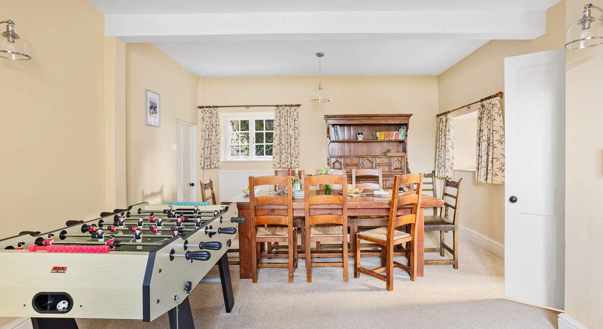 Gather everyone around the table for a leisurely supper or glass of wine, the kitchen can be found through the door.