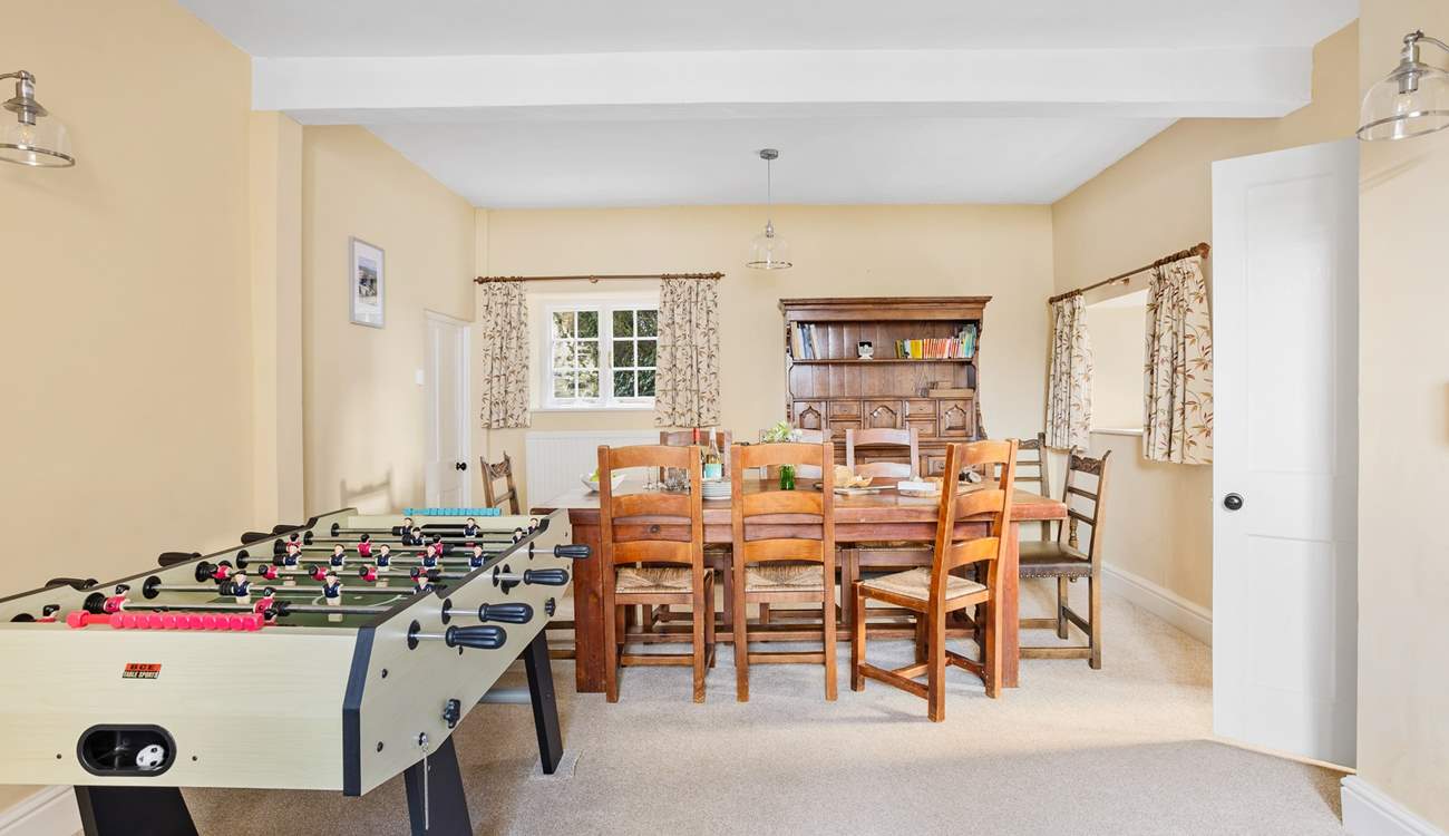Gather everyone around the table for a leisurely supper or glass of wine, the kitchen can be found through the door.