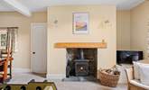 The dining-room is always cosy and warm thanks to the log-burner. - Thumbnail Image