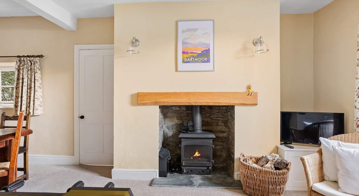 The dining-room is always cosy and warm thanks to the log-burner.