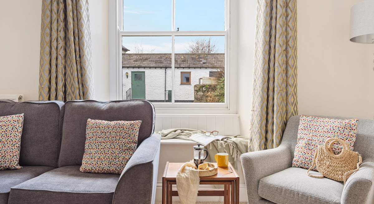 Head to the sitting-room and relax into one of the two plump sofas or take a window pew looking out over the courtyard. 