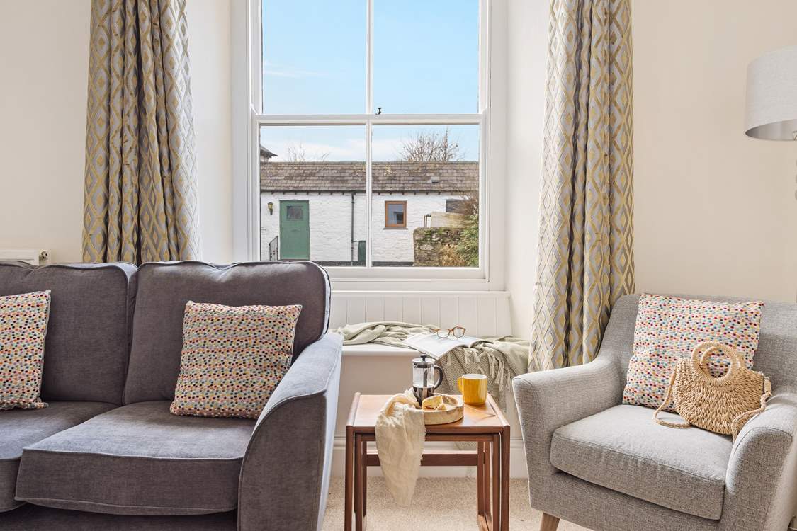 Head to the sitting-room and relax into one of the two plump sofas or take a window pew looking out over the courtyard.
