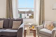 Head to the sitting-room and relax into one of the two plump sofas or take a window pew looking out over the courtyard.