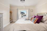 Gorgeous bedroom four has a king-size double bed and an en suite shower-room.