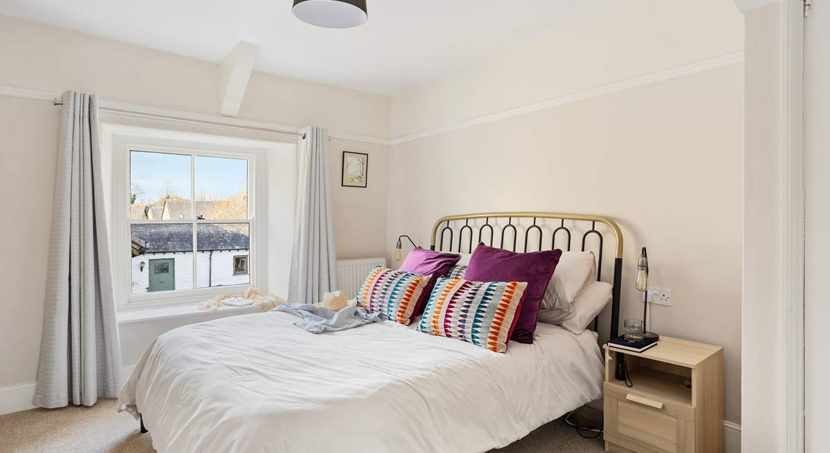 Bedroom four has lovely furnishings and bed linens; this is a room you can retreat to!