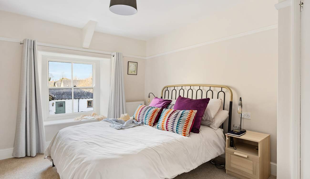 Bedroom four has lovely furnishings and bed linens; this is a room you can retreat to!