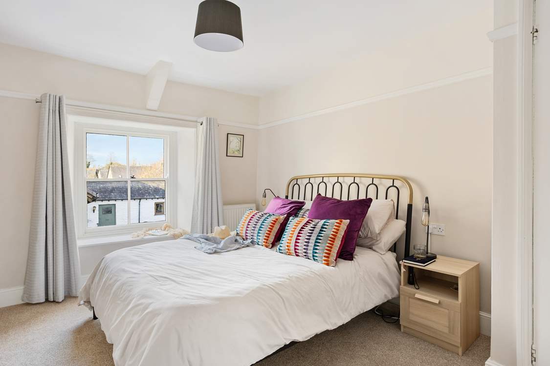 Bedroom four has lovely furnishings and bed linens; this is a room you can retreat to!