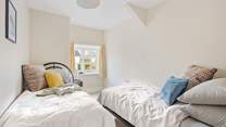 The twin room offers a place to relax and unwind.