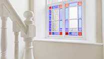 There are many lovely features including the 200 year old stained glass window at this grand house.