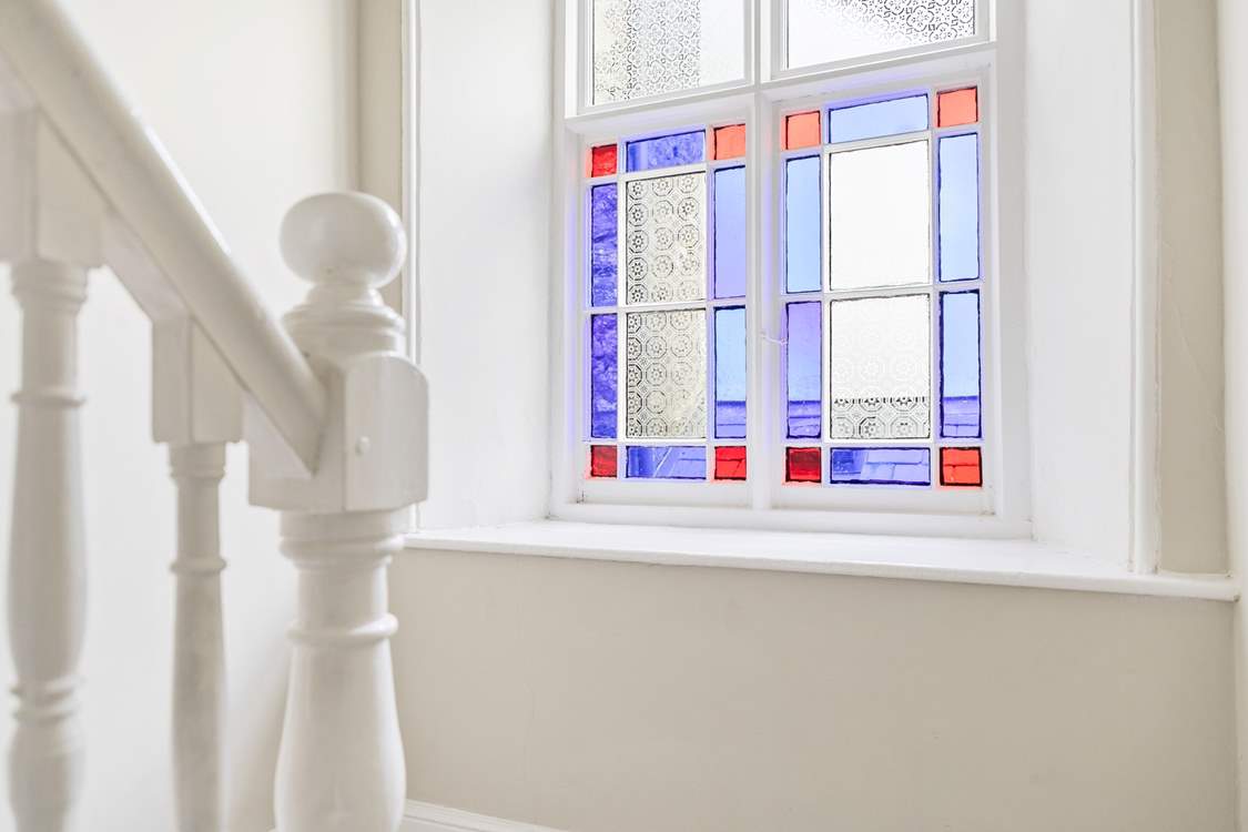 There are many lovely features including the 200 year old stained glass window at this grand house.