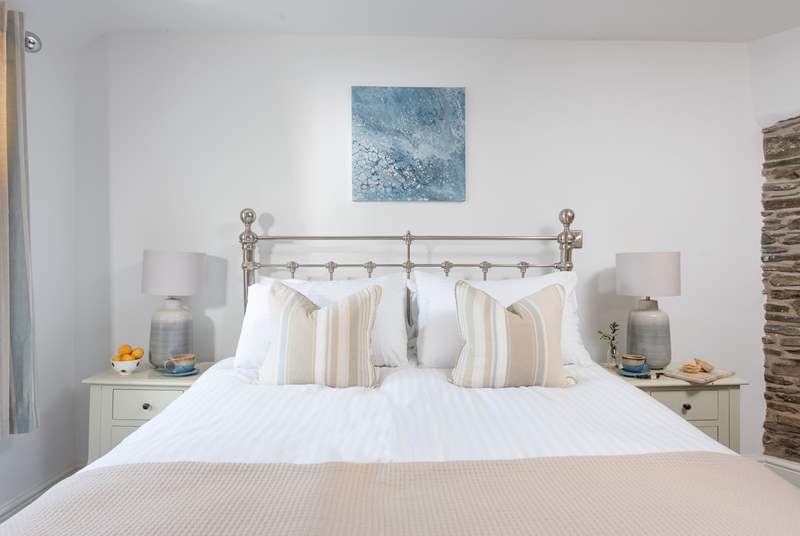 The gorgeous bed in bedroom one invites you to delight in long leisurely lie-ins.