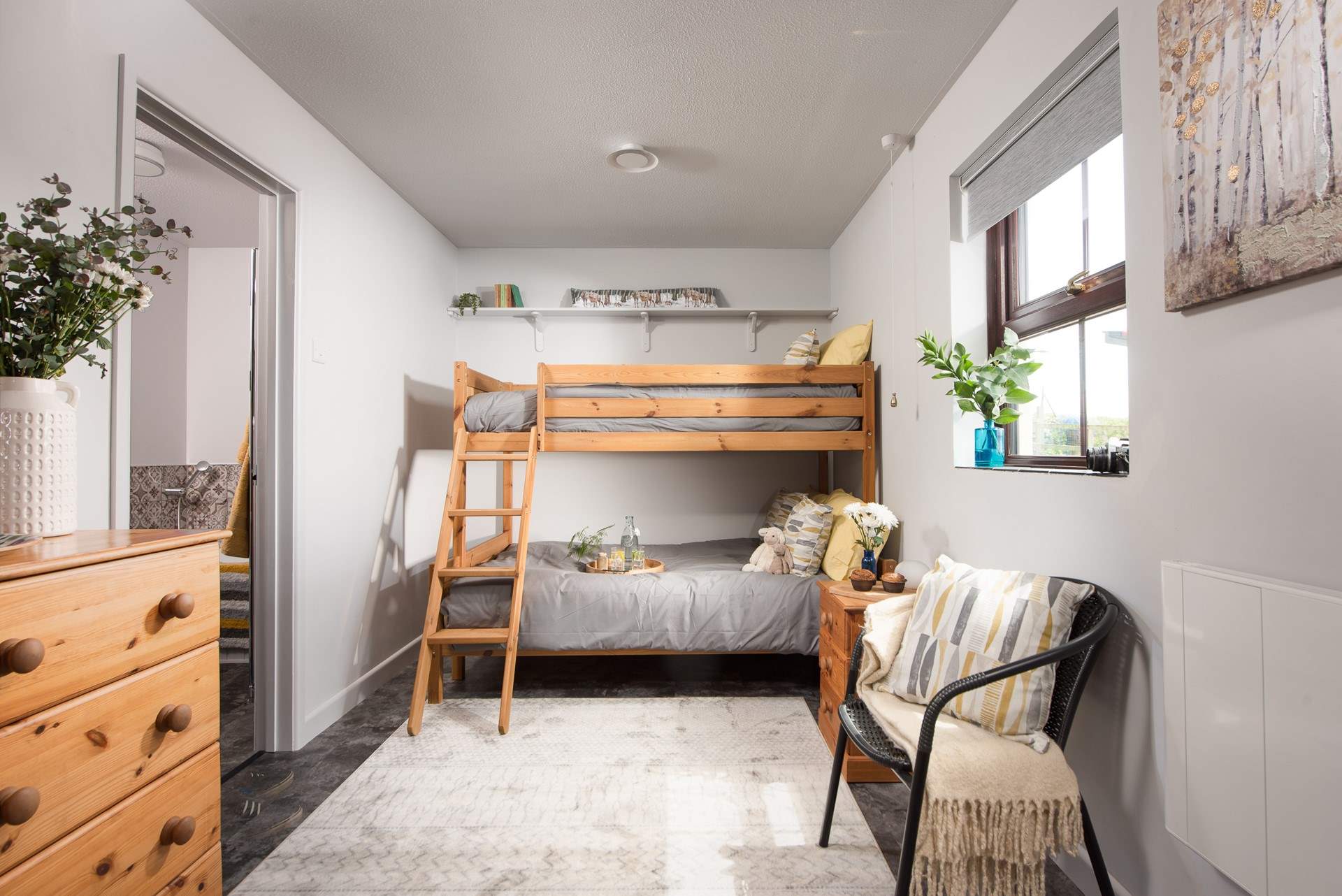 Bedroom 2 has a triple bunk-bed.