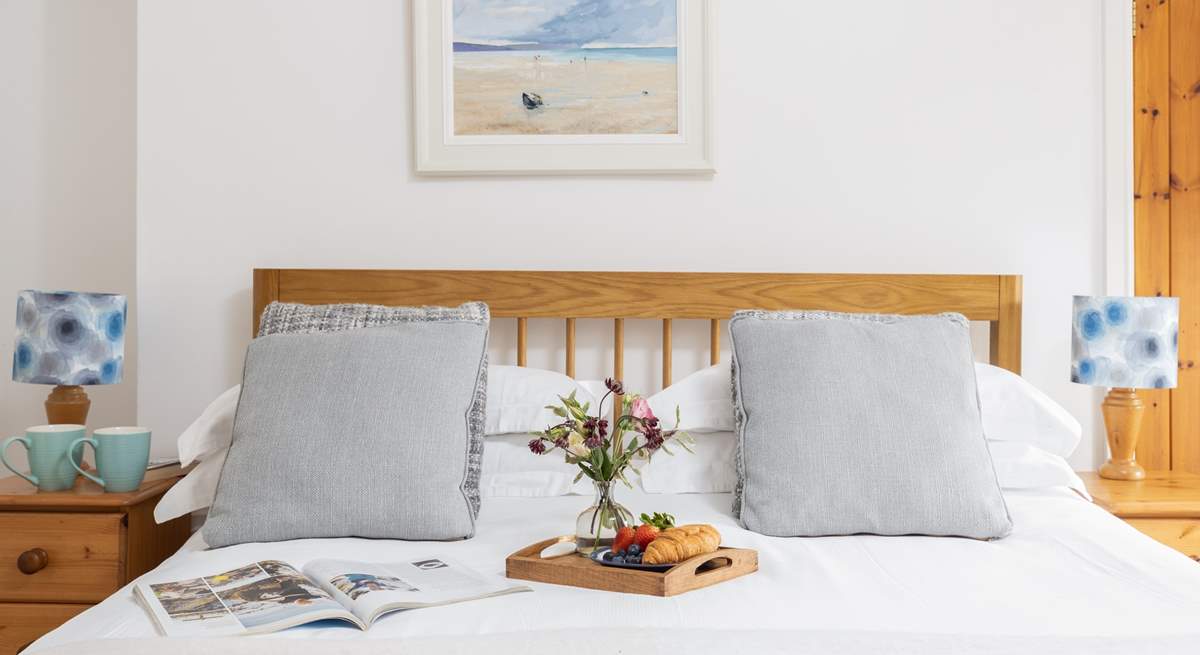 Lovely seaside colours in bedroom 1.