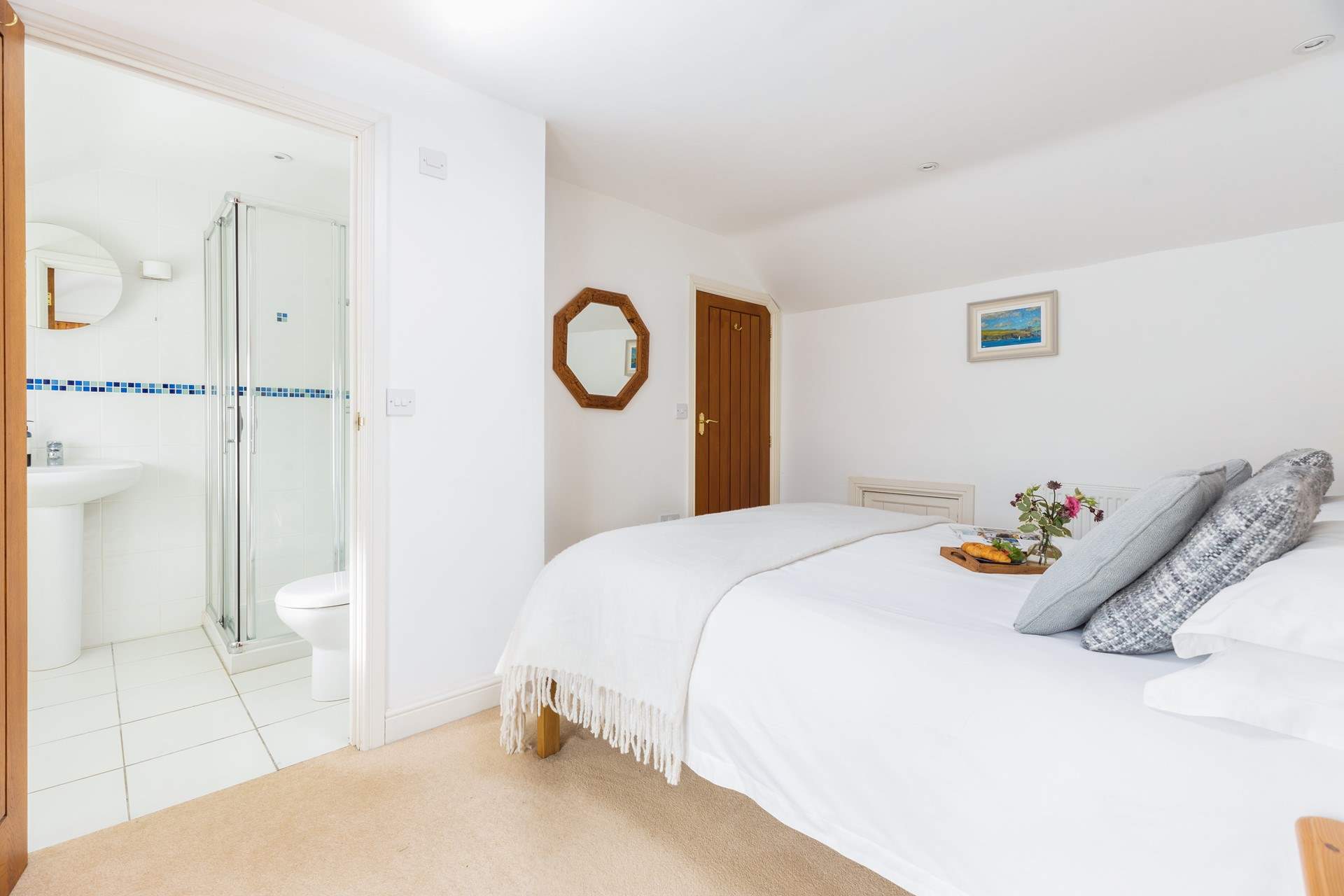 Time for a refreshing shower in the en suite after a busy beach day.