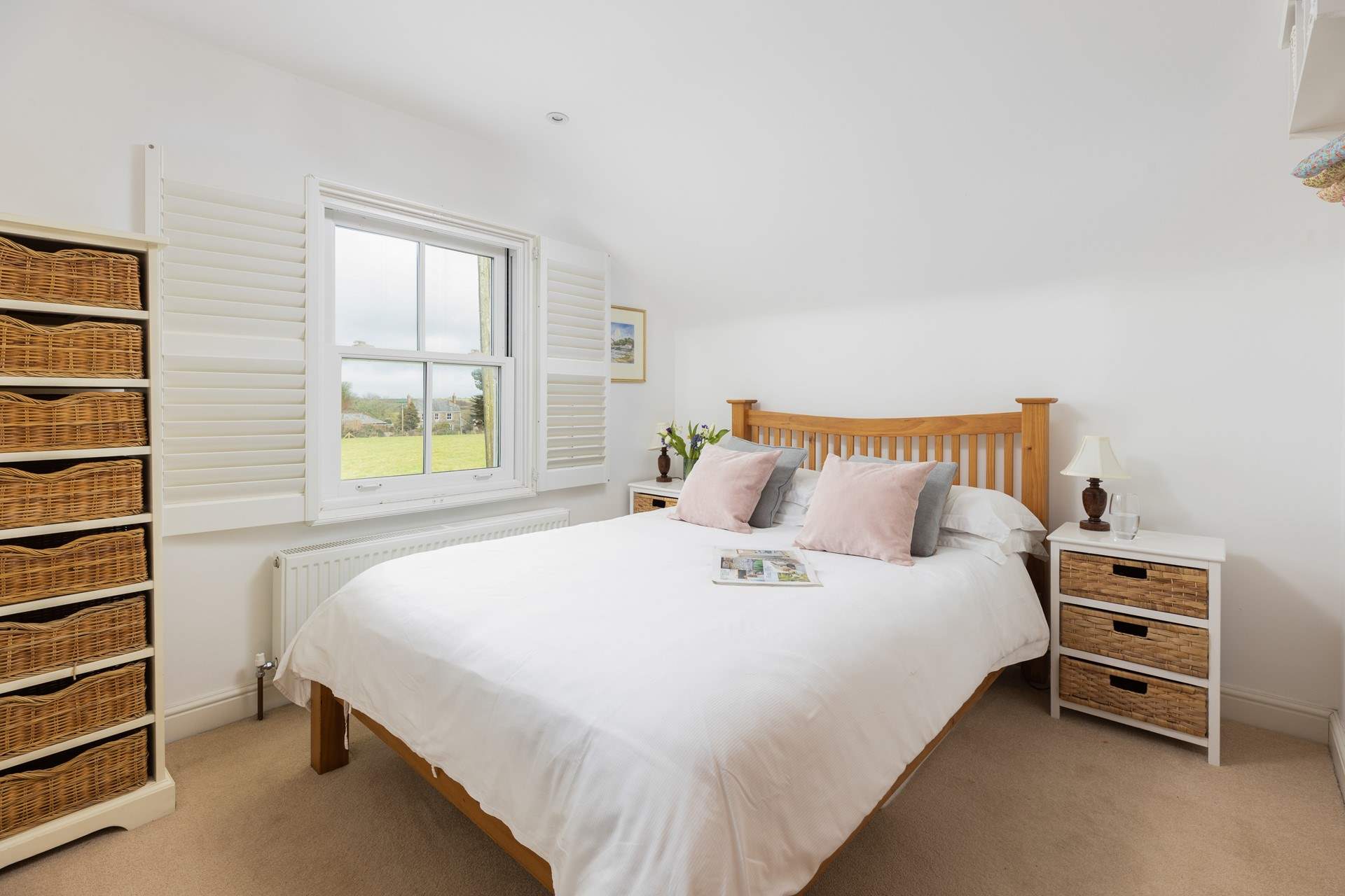 Bedroom 2 is a pretty double bedroom with lovely views over the fields.