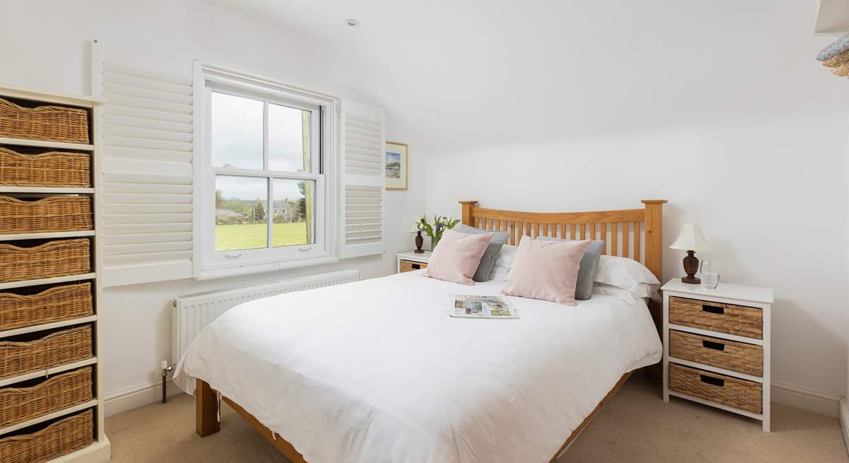 Bedroom 2 is a pretty double bedroom with lovely views over the fields.