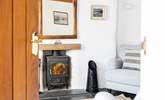 The wood-burner will keep you cosy in cooler months. - Thumbnail Image