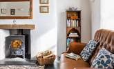 This super stylish room is perfect for catching up on a holiday read in front of the wood-burner. - Thumbnail Image