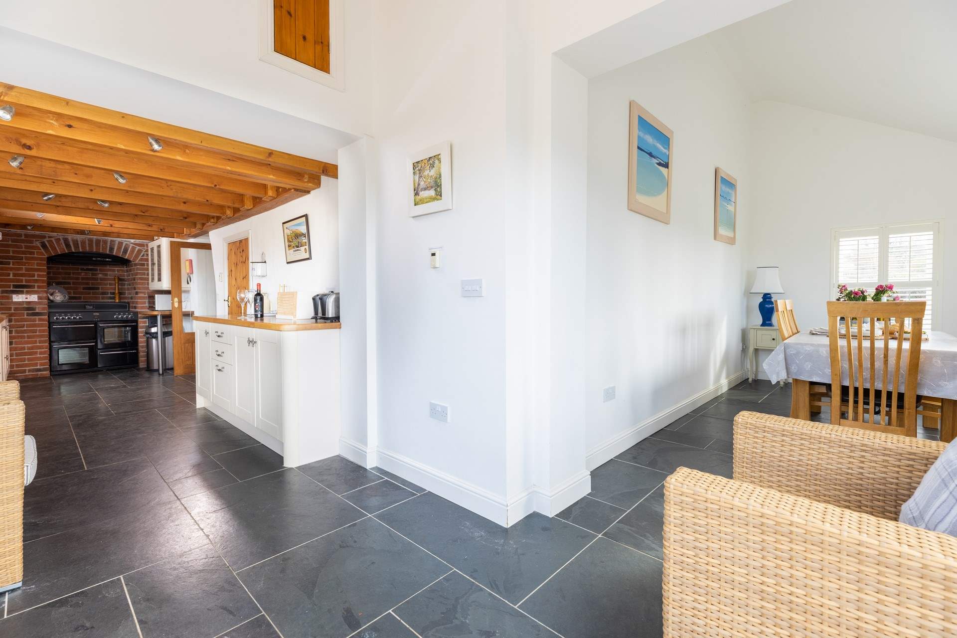 The cleverly designed kitchen leads to the dining area.