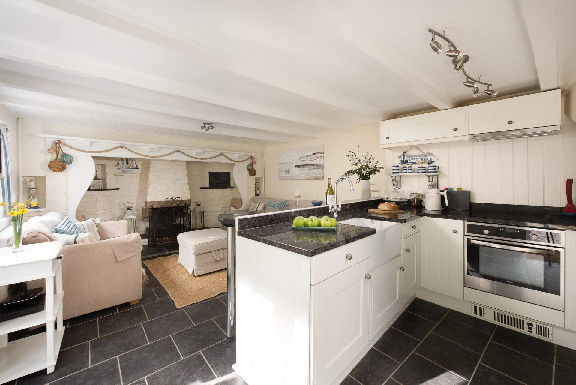 Step into the dreamy open plan living-room.