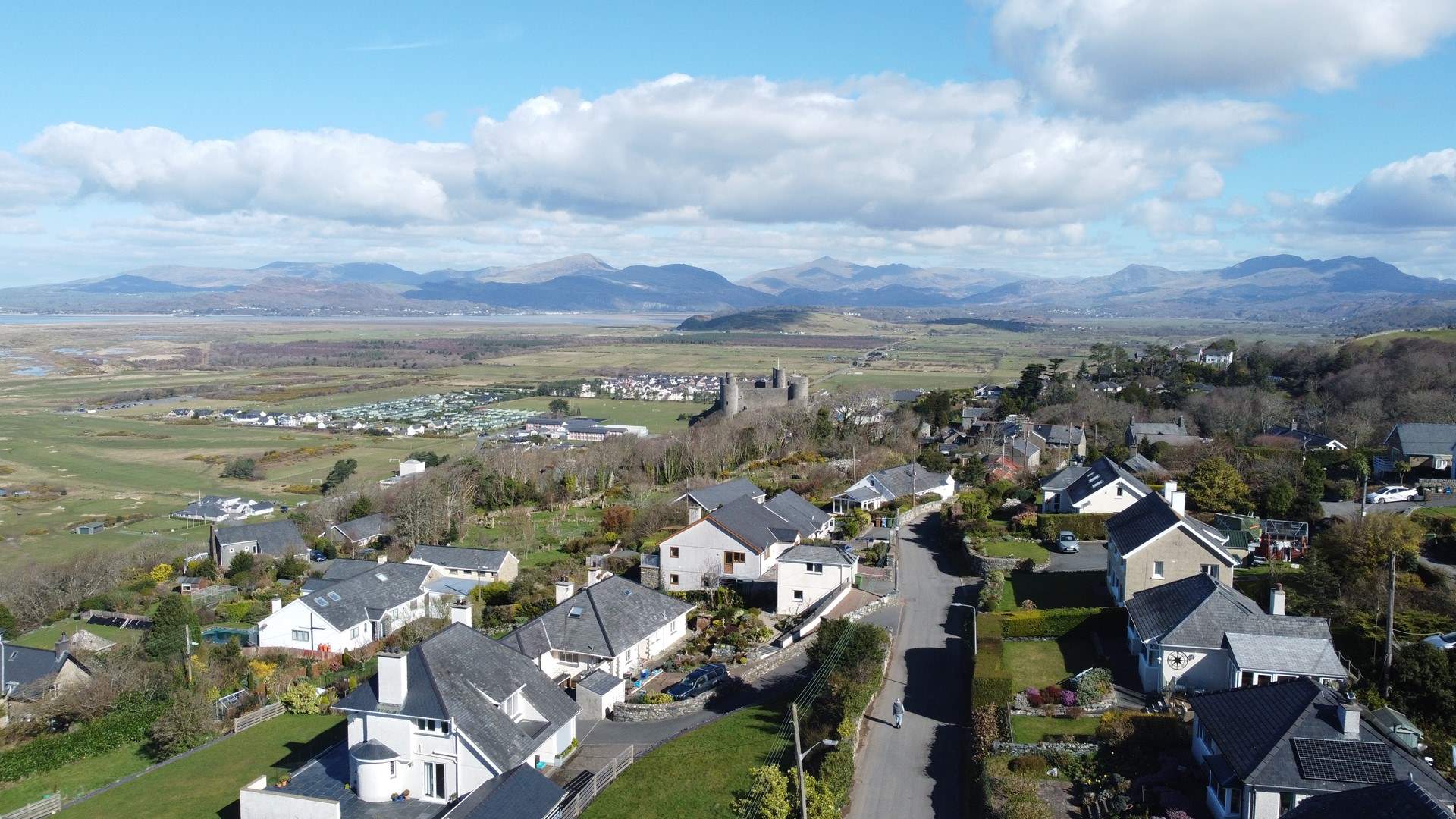 The mountains in the distance.