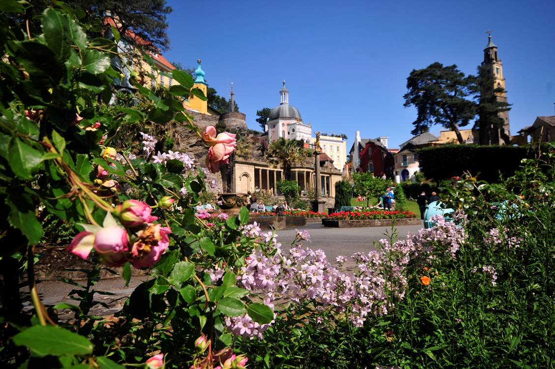 Portmeirion’s enchanting garden, where vibrant blooms match the beautiful architecture.