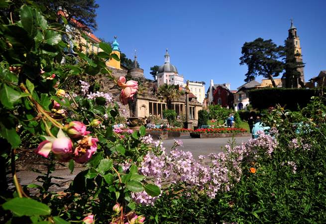 Portmeirion’s enchanting garden, where vibrant blooms match the beautiful architecture.