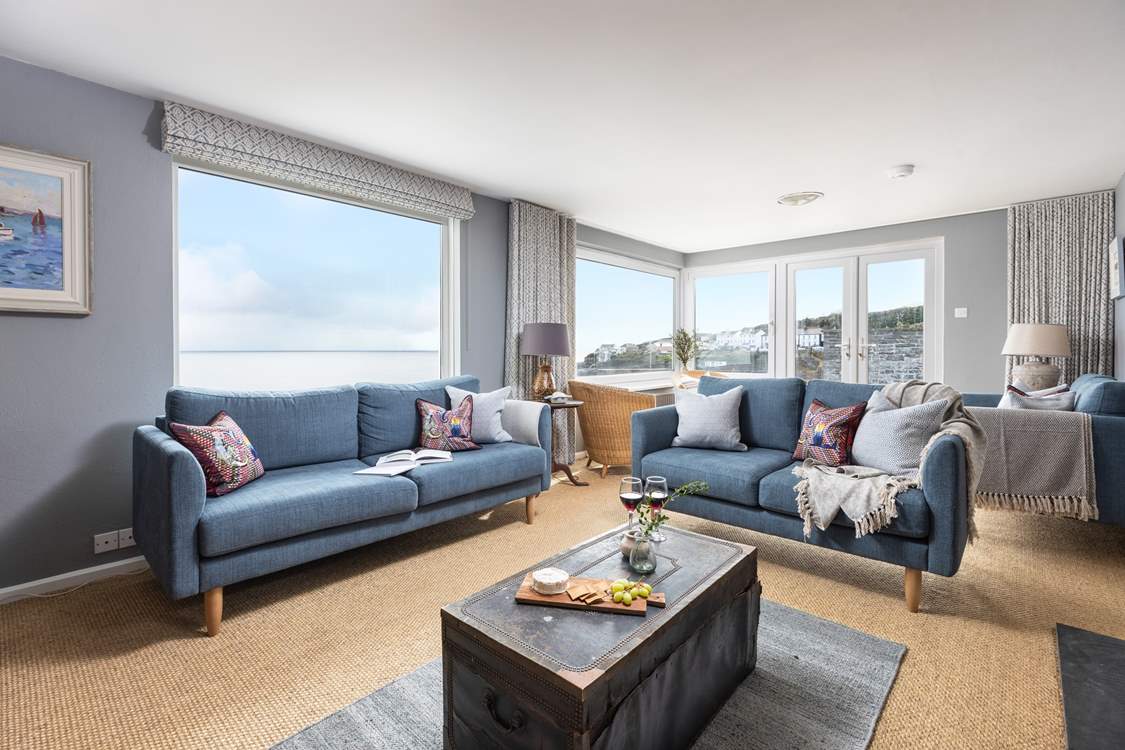 The dual aspect sitting-room has breathtaking views throughout the year.