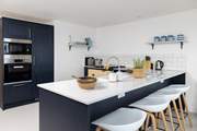 The sociable kitchen/diner has a great breakfast-bar where you can perch on a stool and watch the preparations.