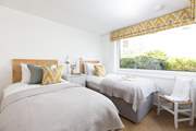 Pretty bedroom 1 on the ground floor has twin beds, perfect for either children or adults.