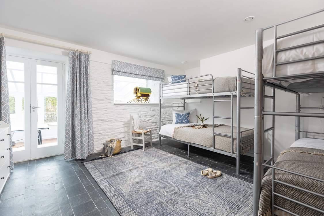 The children in the party will love bedroom 3 with twin bunk-beds.
