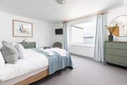 The bedrooms are beautifully furnished in soft pastels and exquisite linens.