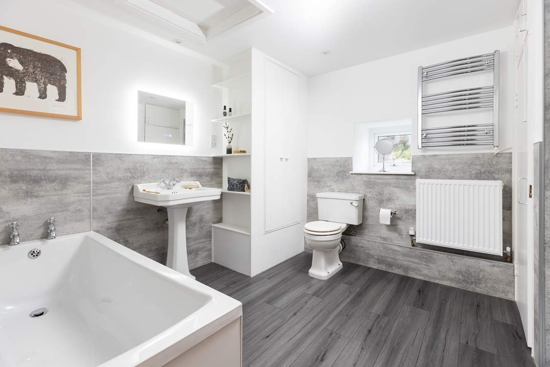 The gorgeous family bathroom on the first floor has a bath and separate shower cubicle.