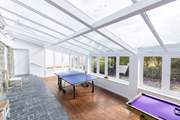 The conservatory has a table-tennis table and a pool table, ideal for games night!
