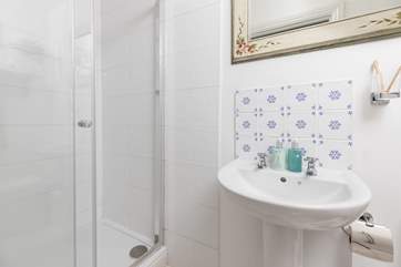 The shower-room leads off the bedroom.