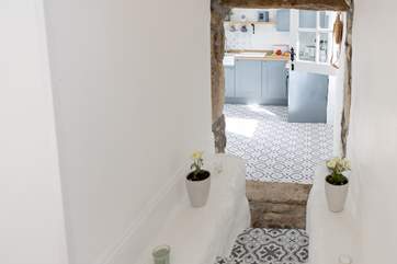 The cleverly crafted steps lead down to the kitchen/diner.